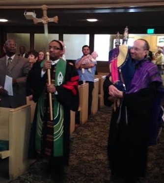 The Rev. Eric Smith, left, and Rabbi Adam Morris in processional at worship service celebrating covenant between Park Hill United Methodist Church and Temple Micah in Denver. Photo courtesy of Donald E. Messer and Park Hill UMC.