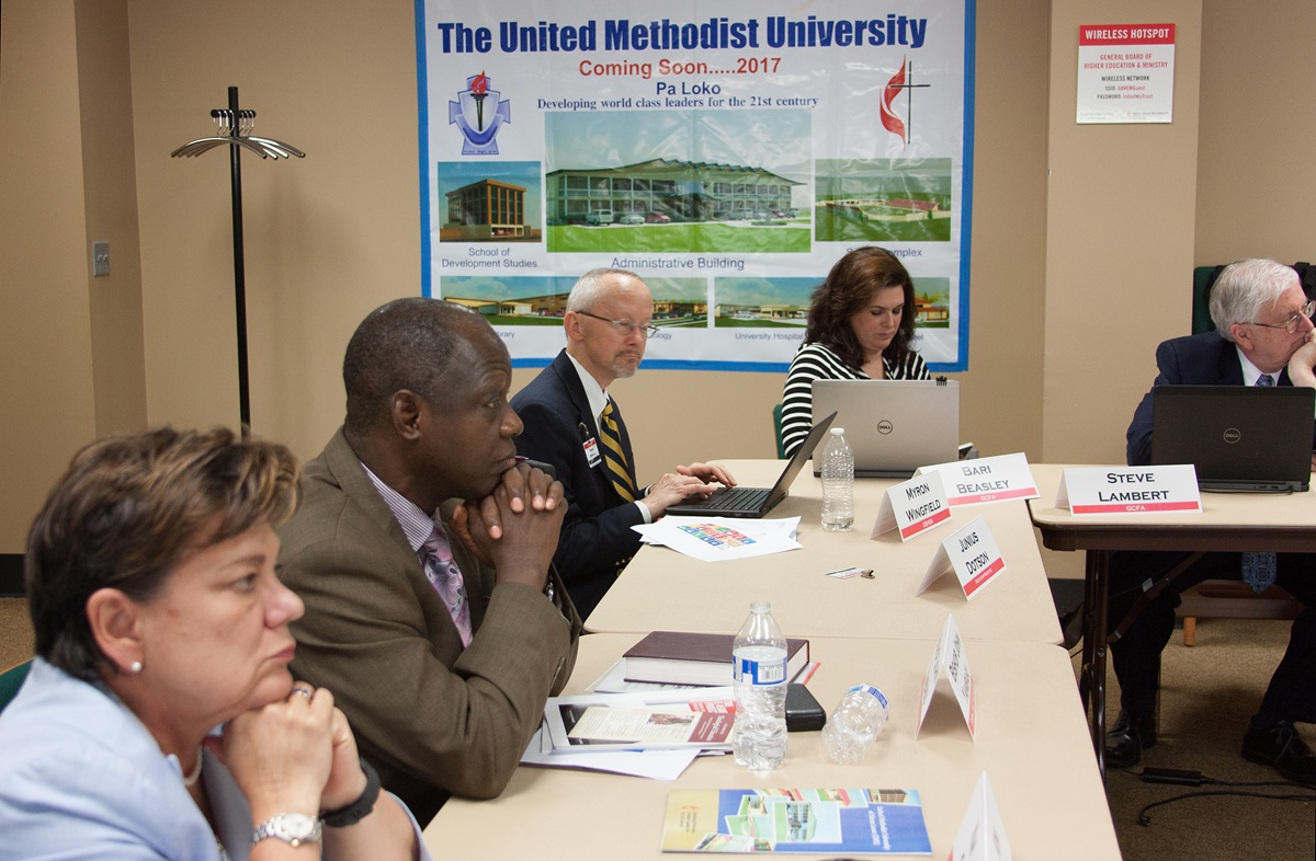 A recent roundtable meeting about the new United Methodist University of Sierra Leone brought together the Rev. Kim Cape (far left), top executive of the United Methodist Board of Higher Education and Ministry, Bishop John Yambasu (second from left) and other church leaders. The university is to open in October. Photo by Jan Snider, UMNS