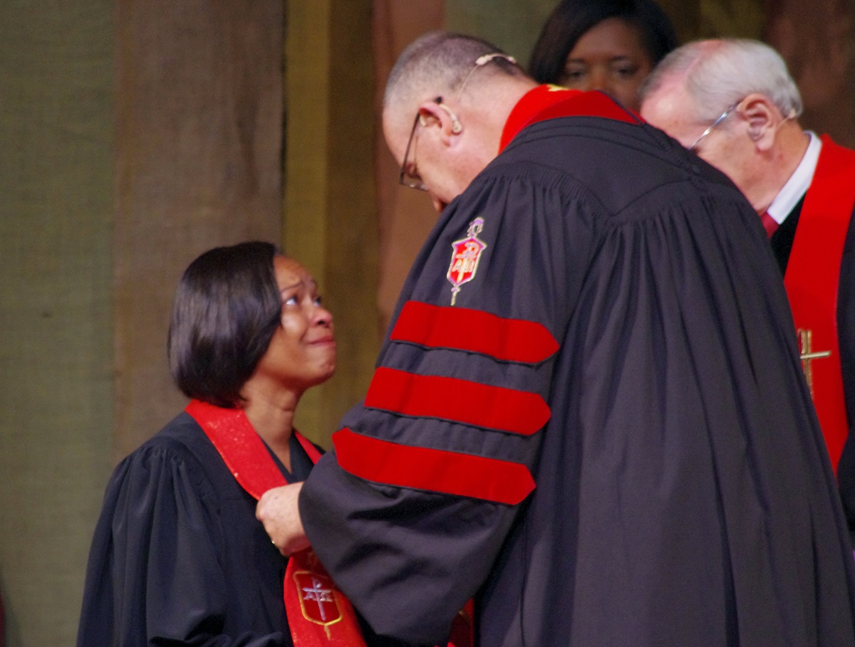Bishop Sharma Lewis shares a moment with Bishop Lindsey Davis, her former bishop in North Georgia Conference, during her consecration on July 15 at Lake Junaluska Conference and Retreat Center at Lake Junaluska, N.C. Photo by Burt Williams, Western North Carolina Conference