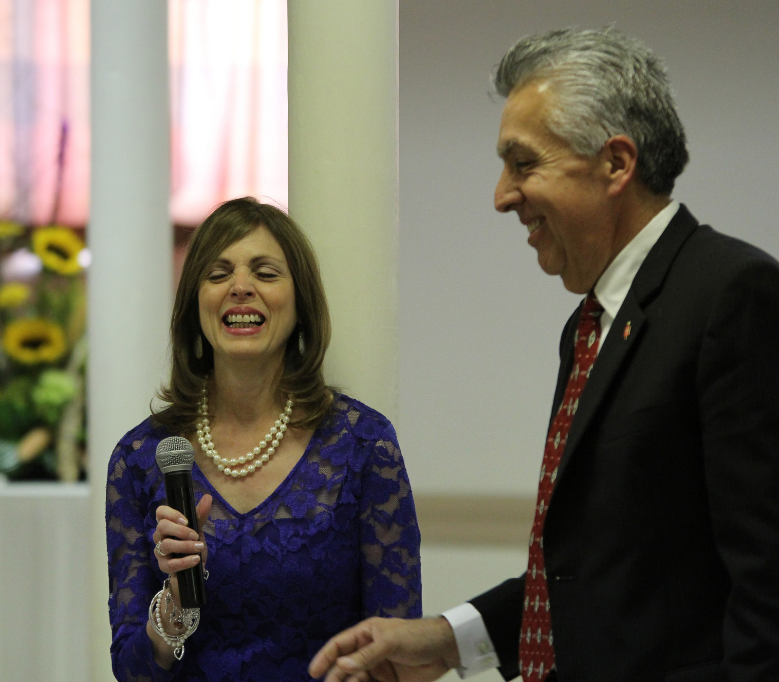 Bishop Ruben Saenz Jr. and his wife, Maye, enjoy a laugh as they speak to a Great Plains Conference breakfast in Wichita, Kan., on July 16.  Photo by Todd Seifert, Great Plains Conference