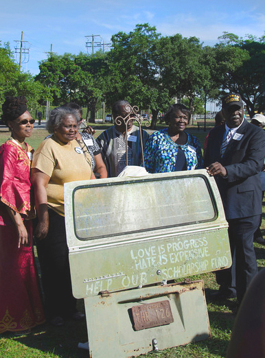 Marking the 2014 send-off of the back panel of the VW bus owned by their father, Esau Jenkins, to the Smithsonian were, from left, Elaine Jenkins, Francena J. Buncomb,
Lorretta J. Saunders, James Jenkins, Marie J. Jones and Abraham Bill Jenkins, Sr. The panel is part of a permanent exhibit at the new National Museum of African American History and Culture. Photo courtesy of Elaine Jenkins.
