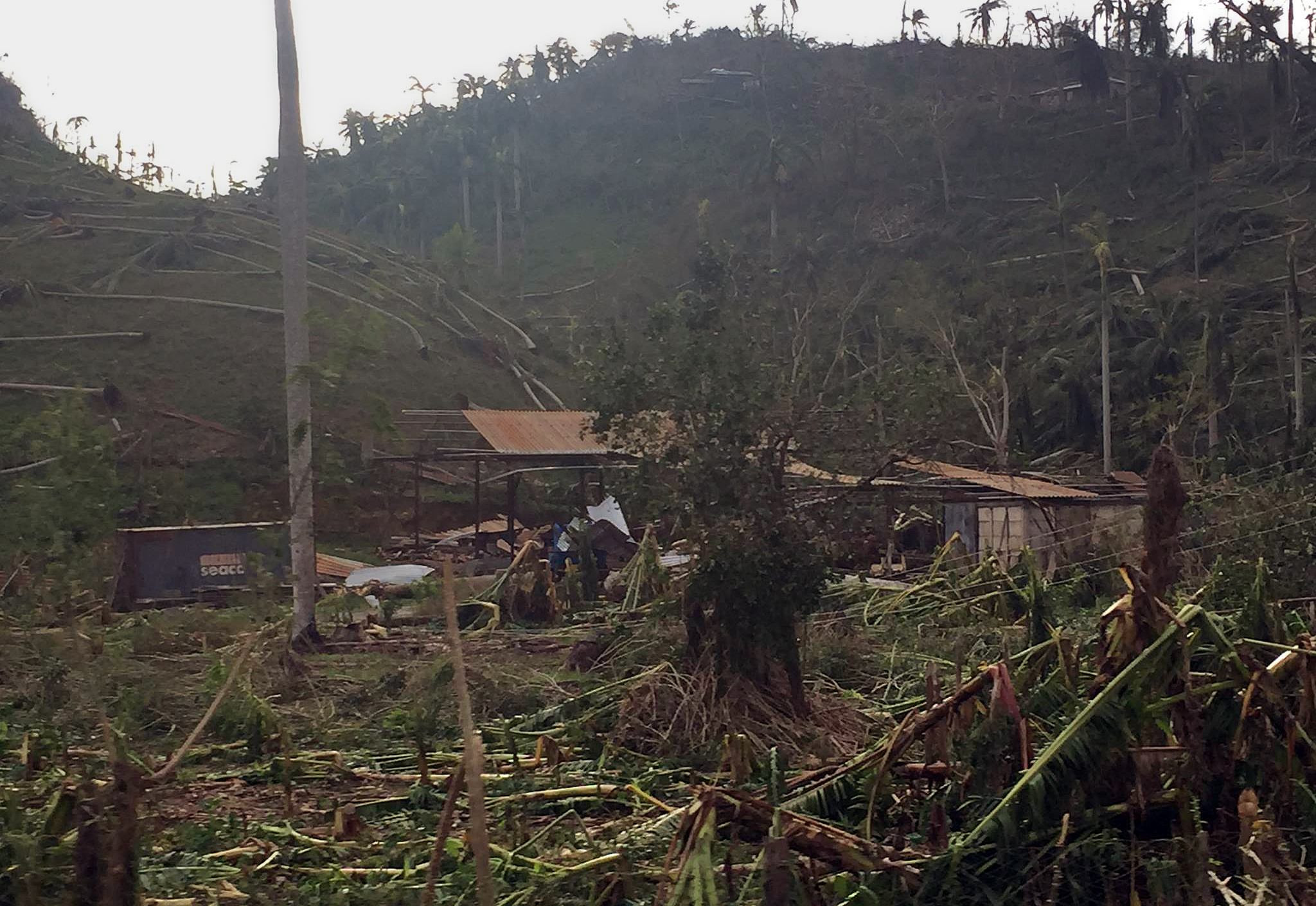 Methodist Bishop Ricardo Pereira Diaz and other Methodist pastors were some of the first people to reach Baracoa, Cuba, on Oct. 6, to bring emergency supplies for church members and neighbors affected by Hurricane Matthew. 