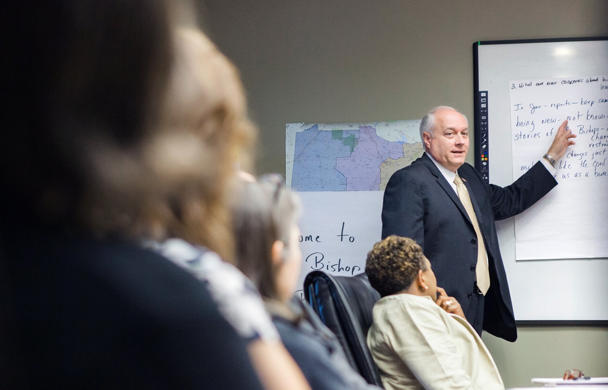 Bishop David Graves of the Alabama-West Florida Conference leads his staff through a Sept. 12 on-boarding session at the conference office in Montgomery, Ala. Photo by Luke Lucas.