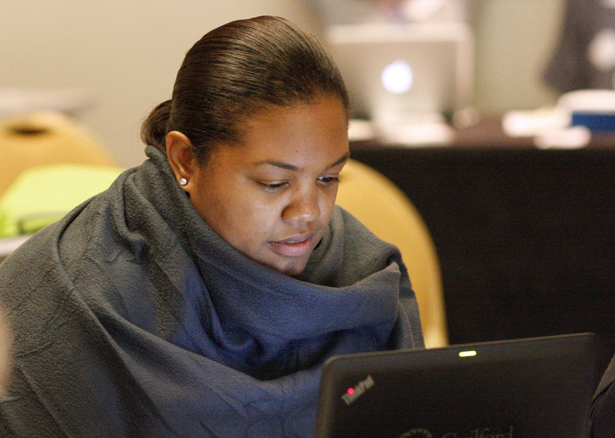 Dana Lyles of the Western North Carolina Conference works during a meeting of the United Methodist Connectional Table meeting in Jacksonville, Fla. Photo by Kathy L. Gilbert, UMNS.