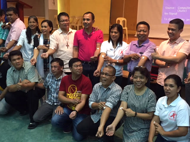 Clergy and laity members who volunteered for a blood screening smile after their tests during a forum to promote AIDS awareness and prevention. “Critical Thinkers: Steadfast in Pursuing Shalom” was sponsored by the United Methodist Global AIDS Fund. Photo by Gladys P. Mangiduyos, UMNS.