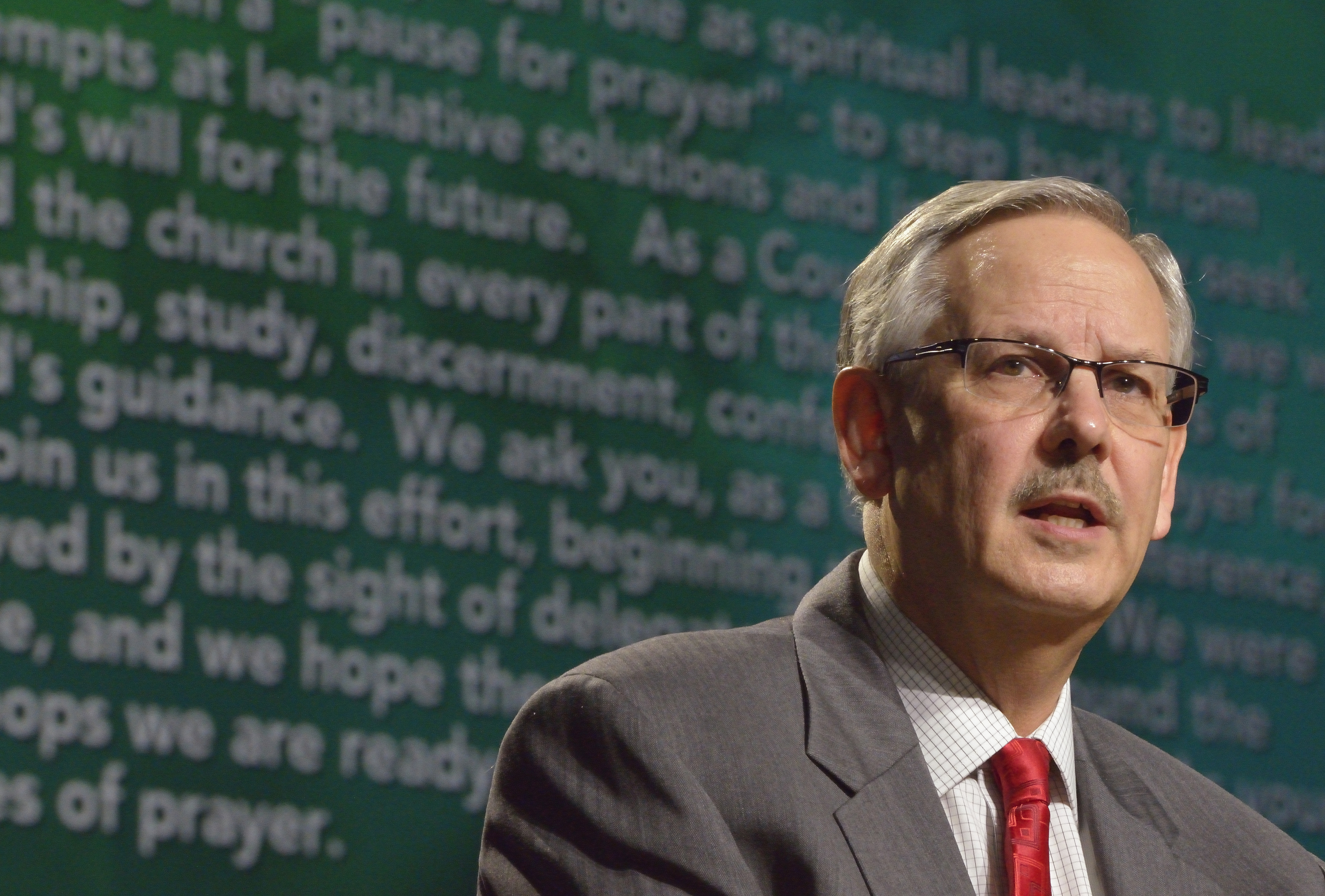 Bishop Bruce R. Ough reads a statement about sexuality and the church from the denomination's Council of Bishops on May 18 at the 2016 United Methodist General Conference in Portland, Ore. Photo by Paul Jeffrey, UMNS.