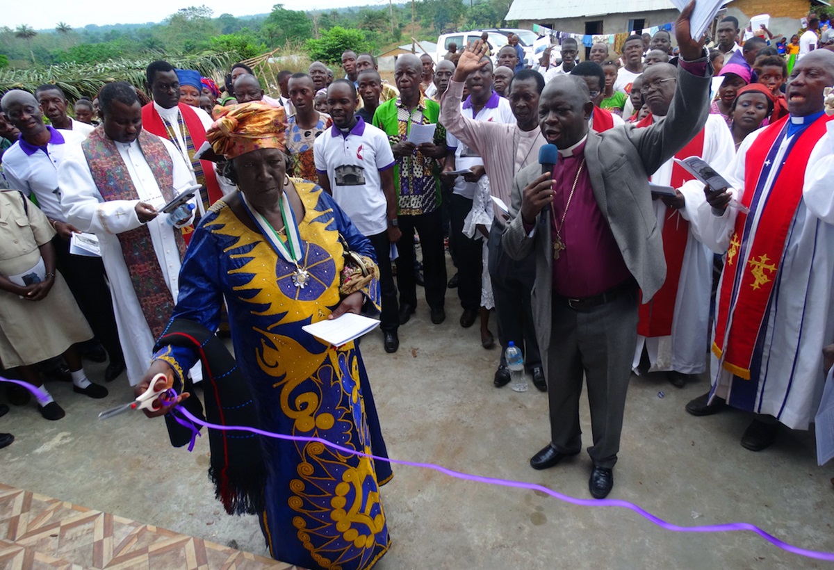 Paramount Chief Madam Matilda Yayo Yilla cuts the ribbon at the official opening of Wesley United Methodist Church in Pujehun, southern Sierra Leone. Photo by Phileas Jusu, UMNS