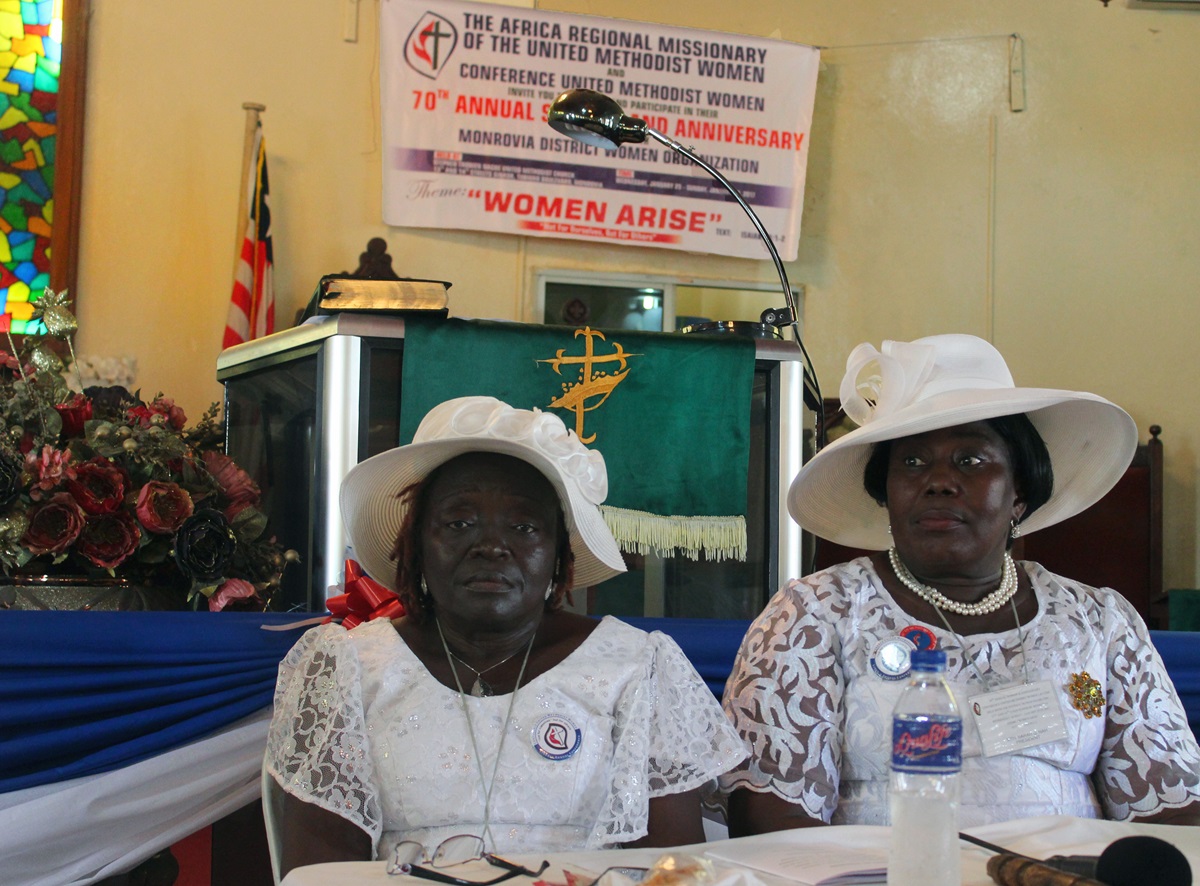Taryonnoh N. Doe (left), vice president of the Conference of United Methodist Women in Liberia, and Sarah Q. Nah, president, preside over General Resolutions during their 70th Annual Session on Jan. 29. The United Methodist Women in Liberia have launched a campaign to promote the rights of girls, including access to education and freedom from violence. Photo by Julu Swen, UMNS.