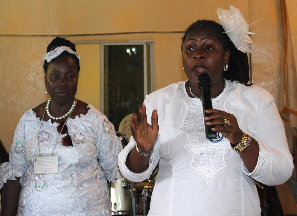 Paulina Doe-Hilton leads the discussion on the General Resolutions of the United Methodist Women in Liberia, during their conference on Jan. 29. The United Methodist Women in Liberia approved several resolutions including the one to campaign for the rights of the girl child. Photo by Julu Swen, UMNS.