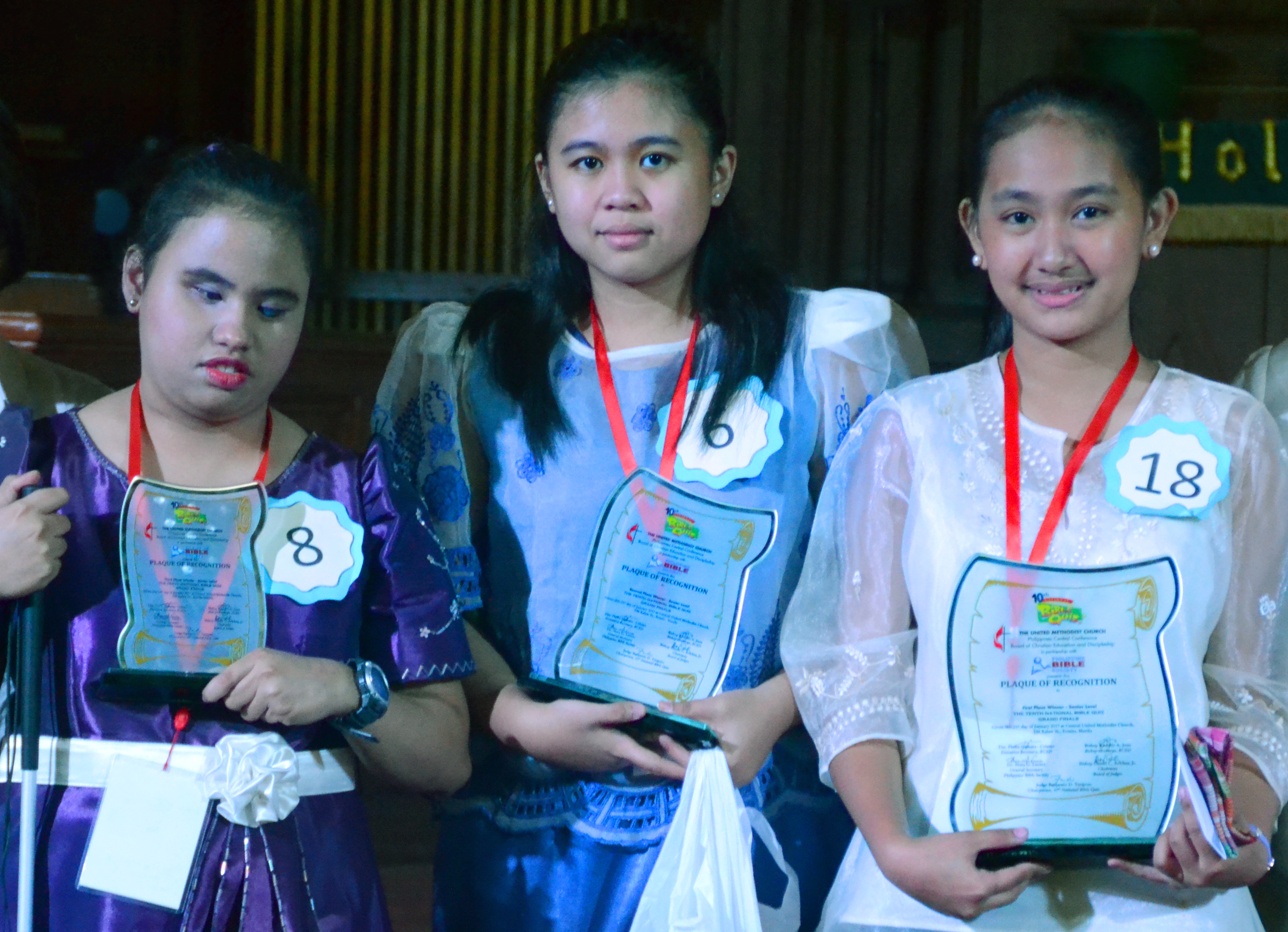 Senior division winners of the 10th National Bible Quiz in Manilla, Philippines, were Faith Eunice Rubante (left), Central Luzon Philippines Conference, third place; Angela Joy Balod, Northern Philippines Conference, second place; and Niomi Nicole Salitico, Bulacan Philippines Conference, first place. The Grand Finals were held at Central United Methodist Church on Jan. 21, 2017. Photo courtesy of Jeremiah and Melvin Nor Ramos.