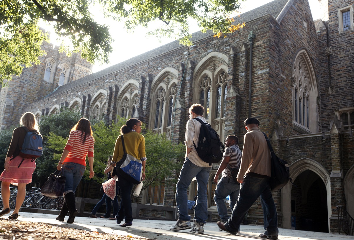 Students walk on the campus of United Methodist-related Duke University in Durham, N.C. Duke and Emory University in Atlanta, Georgia, are joining fifteen other private colleges in a legal challenge to President Donald Trump’s immigration restrictions. Photo courtesy of Duke Photography.