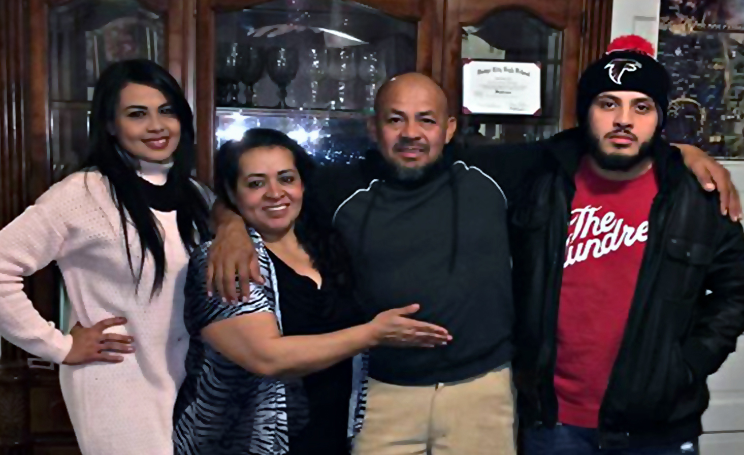 Humberto Barralaga, second from right, was arrested by officials with the U.S. Immigration and Customs Enforcement on Feb. 7. Barralaga, a member of the lay leadership at the House of Prayer United Methodist Church in Dodge City, Kansas, is shown with his family. Photo courtesy of the Rev. Raciel Quintana.