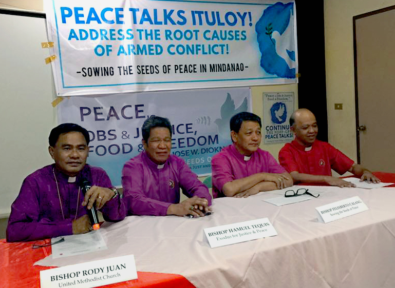 United Methodist Bishop Rodolfo Juan, left, joined other ecumenical members of the National Council of Churches in the Philippines for a Feb. 24 press conference calling for an end to violence and a continuation of peace talks. Photo Courtesy of. the Rev Israel Painit.