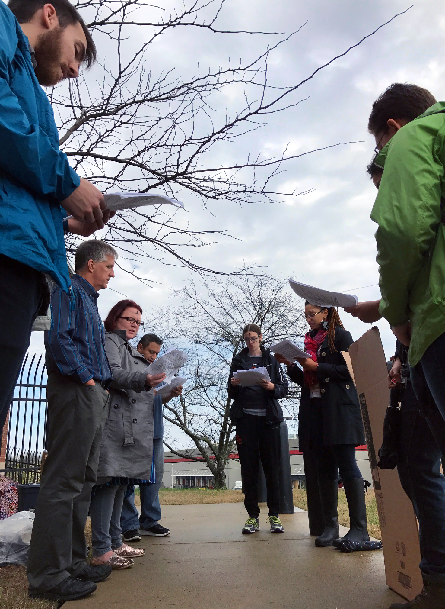Clergy and laypeople from several denominations who are members of the Nashville Community Defense held a prayer vigil in front of the local Immigration and Customs Enforcement agency March1. Photo by Sophia K. R. Agtarap, UMNS.