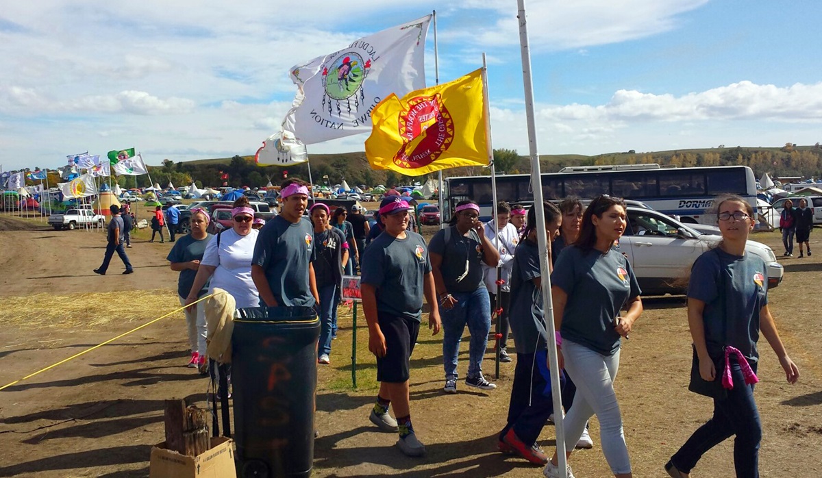 Youth, chaperones and organizers of the Peg-Leg Flamingos conference take in the views during a visit to Standing Rock in North Dakota in September. Photo courtesy of the Rev. Carol Lakota Eastin