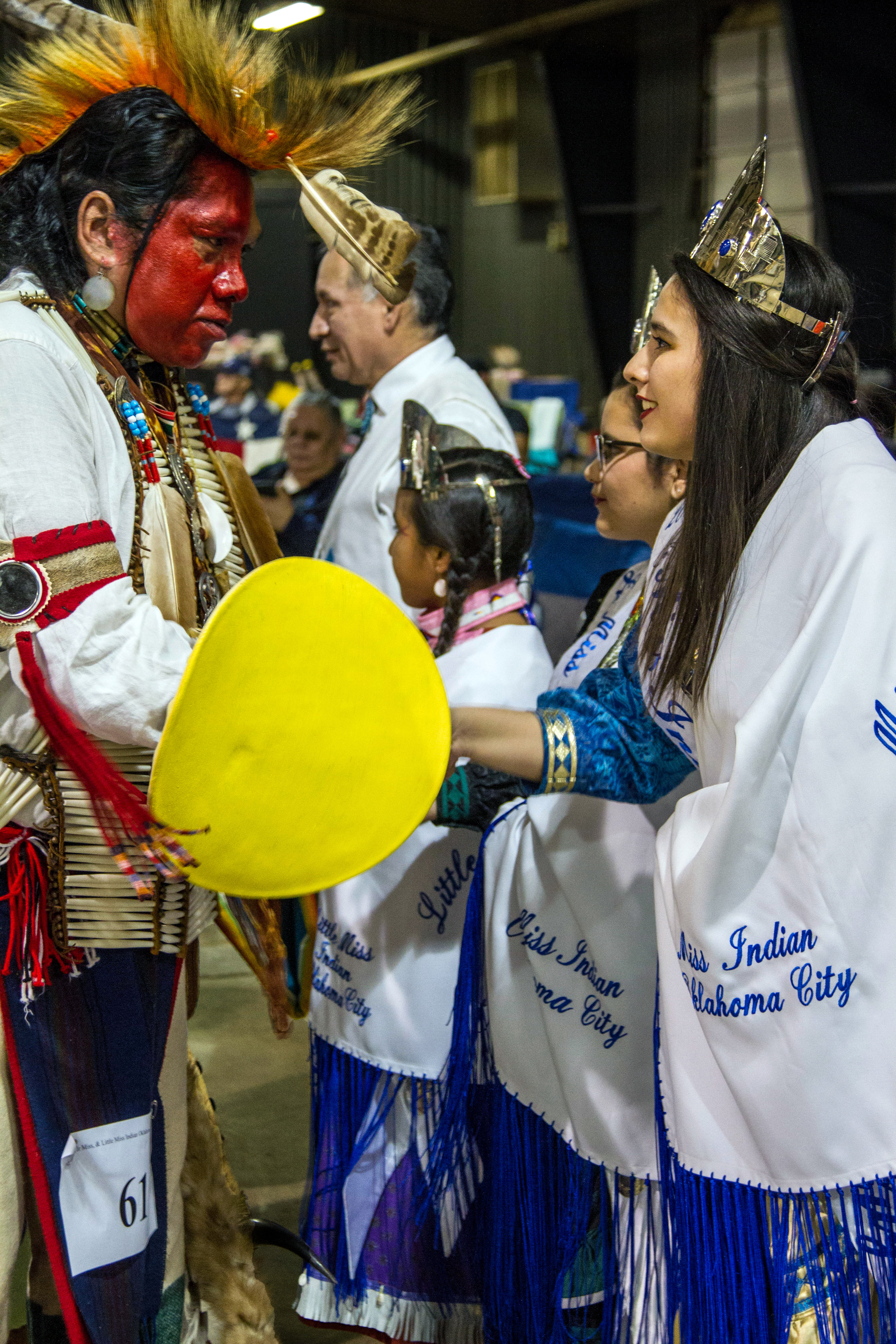 Madeleine Freeman, 2016 Miss Indian Oklahoma City Princess, greets family and friends following a dance honoring her work as the reigning princess. Photo by Ginny Underwood, UMNS.