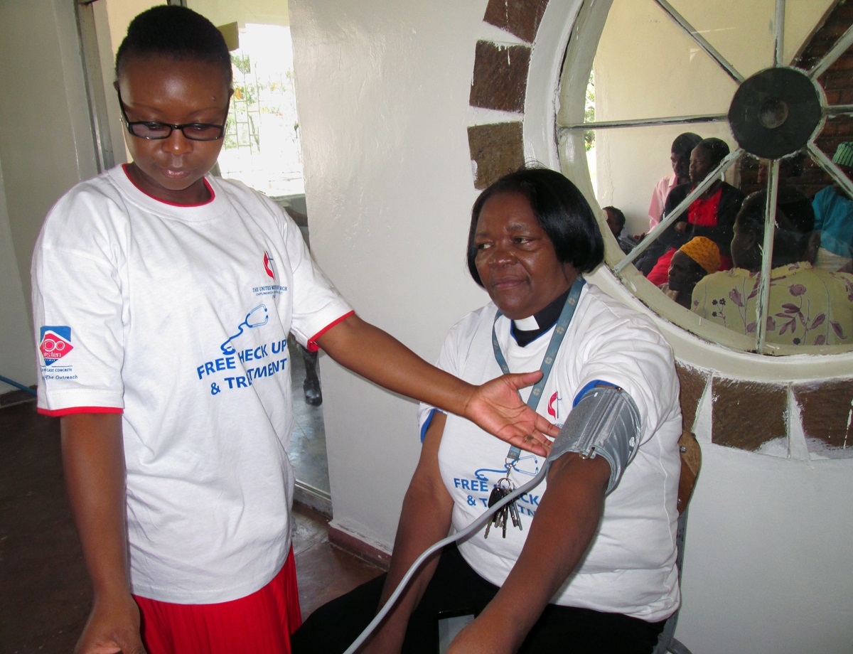 The Rev. Portia Kanoyangwa was the first to receive treatment during a medical outreach program conducted by The United Methodist Church in the Chitungwiza and Marondera rural districts of Zimbabwe. A total of 355 patients with various ailments benefited from the free program. Photo by Kudzai Chingwe, UMNS.