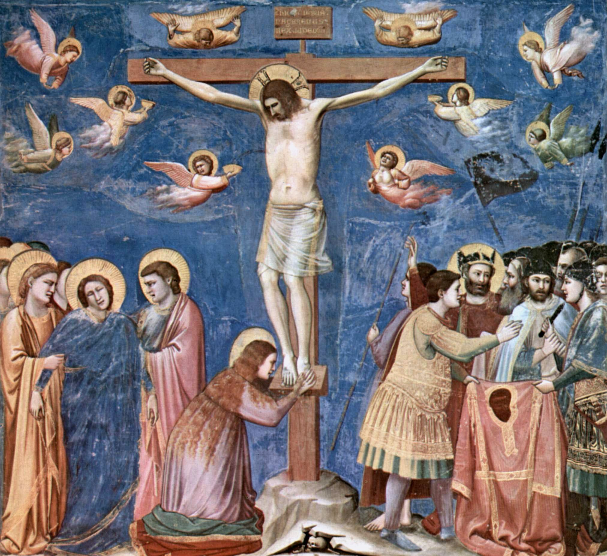 A fresco painting from the late Middle Age by Giotto di Bondone depicts the Crucifixion. On Good Friday, Christians around the world reflect on the meaning of Jesus' suffering and death.