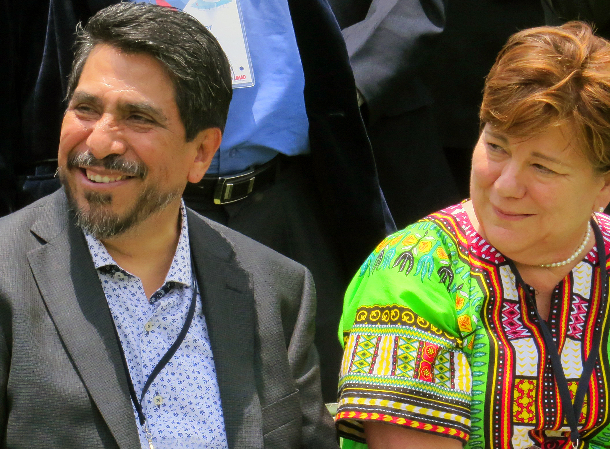 Job Cesar Romero, president of Universidad Madera, and the Rev. Kim Cape, top executive of the United Methodist Board of Higher Education and Ministry, visit before a May 28 group photo shot at the International Association of Methodist-related Schools, Colleges and Universities conference in Puebla, Mexico. Universidad Madero, a Methodist school, is hosting the event. Photo by Sam Hodges, UMNS.