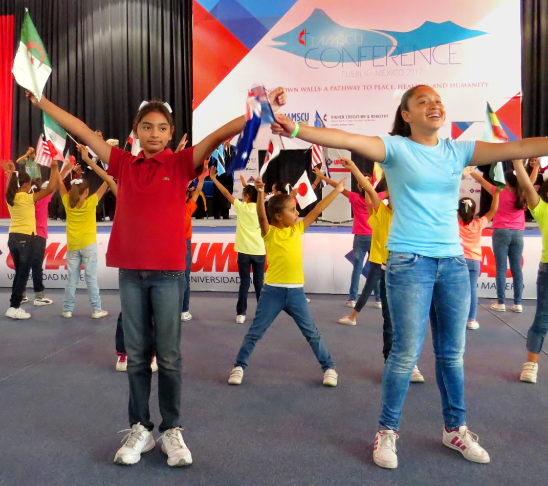 Students at a Methodist school in Puebla, Mexico, danced at the May 28 opening ceremony of the International Association of Methodist-related Schools, Conferences and Universities (IAMSCU) conference. The conference's theme is "Tearing Down Walls: a Pathway to Peace, Healing and Humanity," and the students danced on that theme. Photo by Sam Hodges, UMNS.