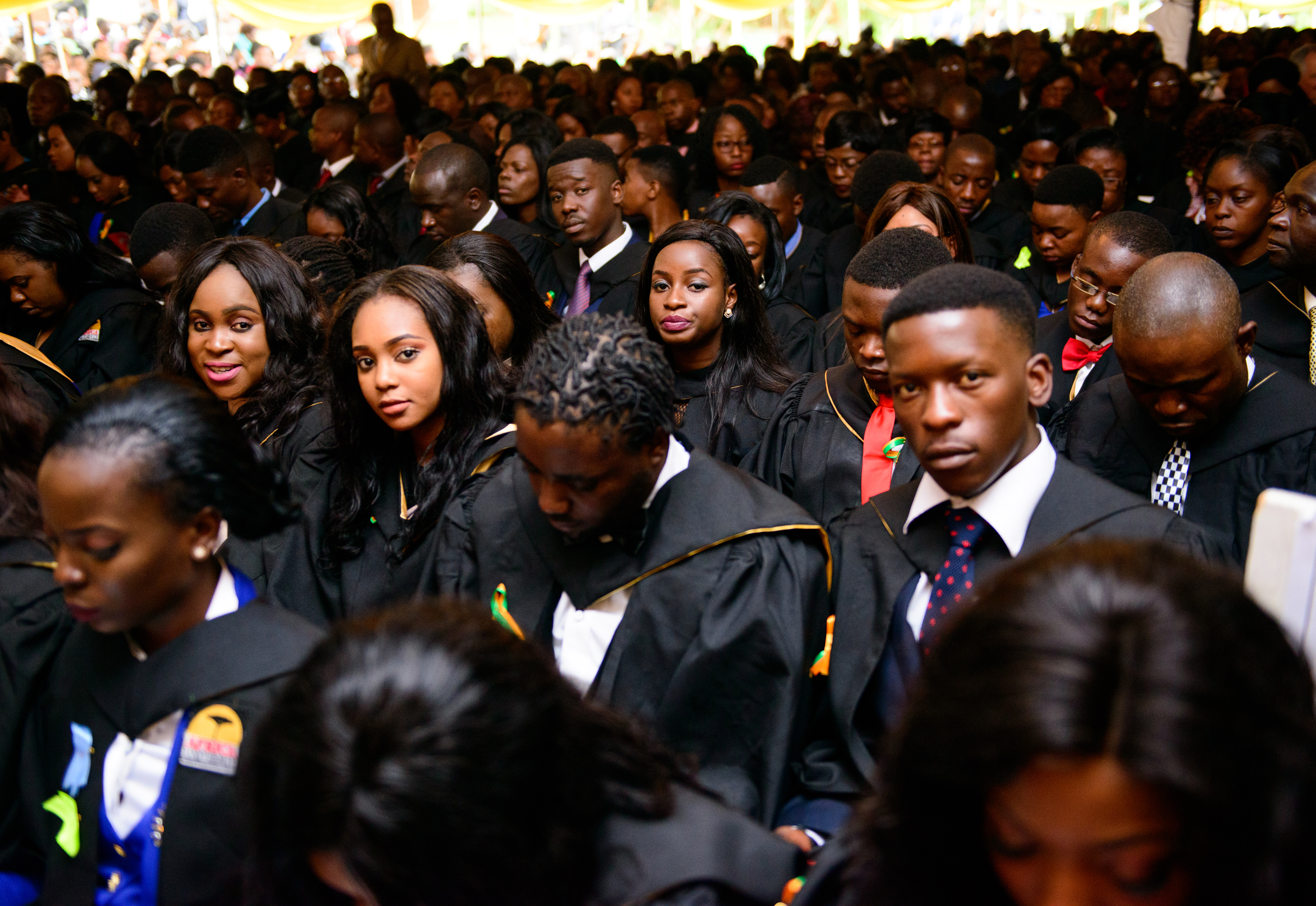 Billy Paul Muderere (right, looking at camera), Munyaradzi Mushaba (second from right, looking down), Gamuchirai Ruvimbo Mushambi (third from right) and Nancy Mutsvairo (fourth from right) are graduates from the Bachelor of Social Sciences in Psychology 2017 honors class at Africa University. Photo courtesy of Africa University. 