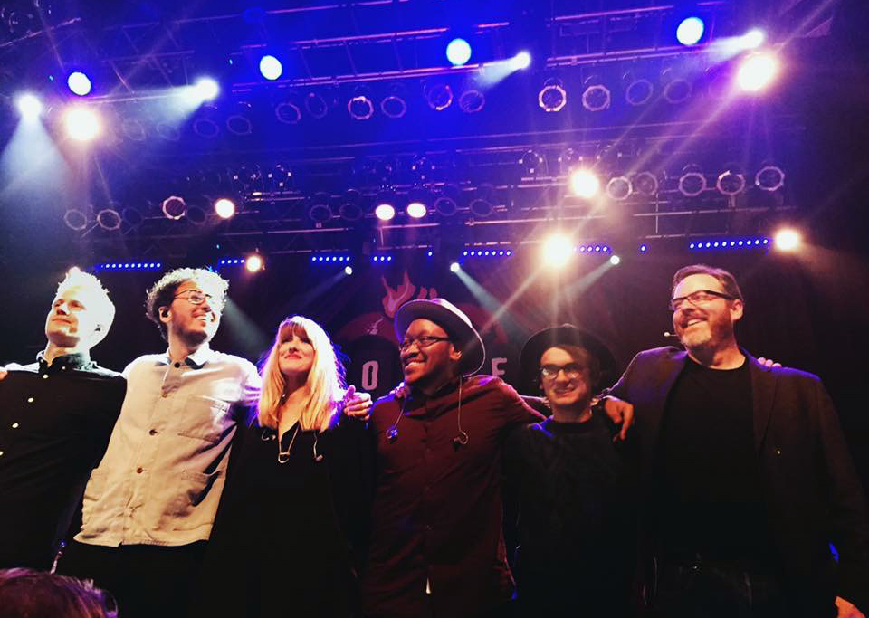Mike McHargue, far right, joins members of the Gungor Musical Collective on stage at The House of Blues in San Diego. His “Ask Science Mike” podcast receives upward of 6,500 downloads a day, and he is in the iTunes “Top 20” podcasters based on measureable internet metrics. Photo courtesy of Mike McHargue.