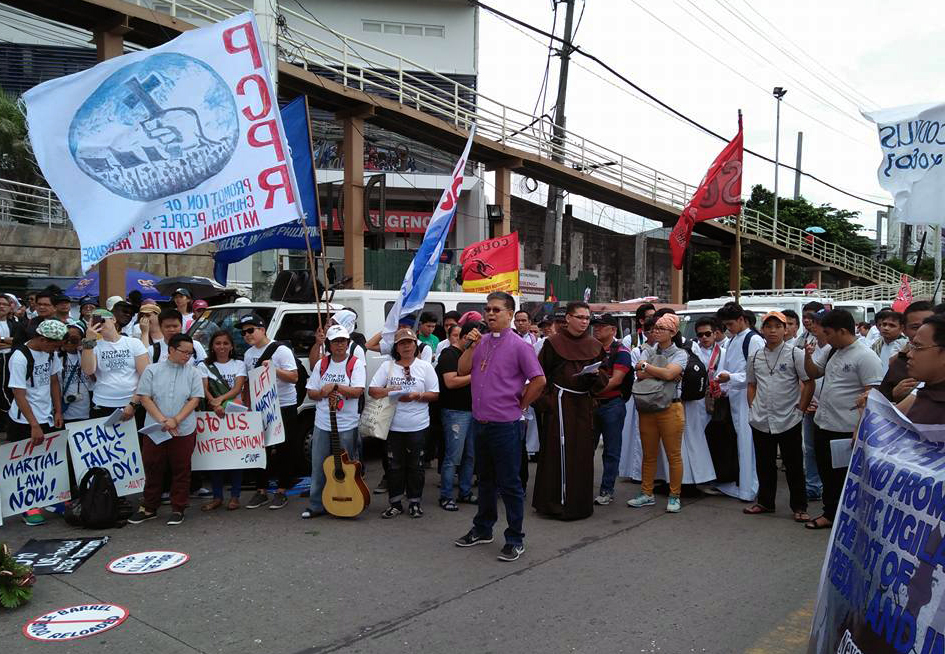 United Methodist Bishop Ciriaco Francisco speaks at a demonstration on the day of Philippines President Rodrigo Duterte’s State of the Nation address on July 24 in Manila. Both Francisco and retired Bishop Solito K. Toquero denounced the extension of martial law in Mindanao. Photo by Sonny G. Dela Pena.