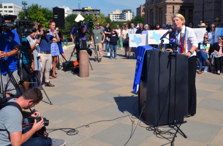 The Rev. Diane McGehee, pastor of Bering Memorial United Methodist Church in Houston, speaks during an interfaith rally in Austin, sponsored by Texas Impact, that opposes a “bathroom bill” being considered by the Texas state legislature. Photo by Susan Risdon.