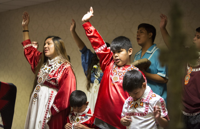 Members of the Choctaw tribe from Mississippi sing in different languages. Photo by Kathleen Barry, UMNS.