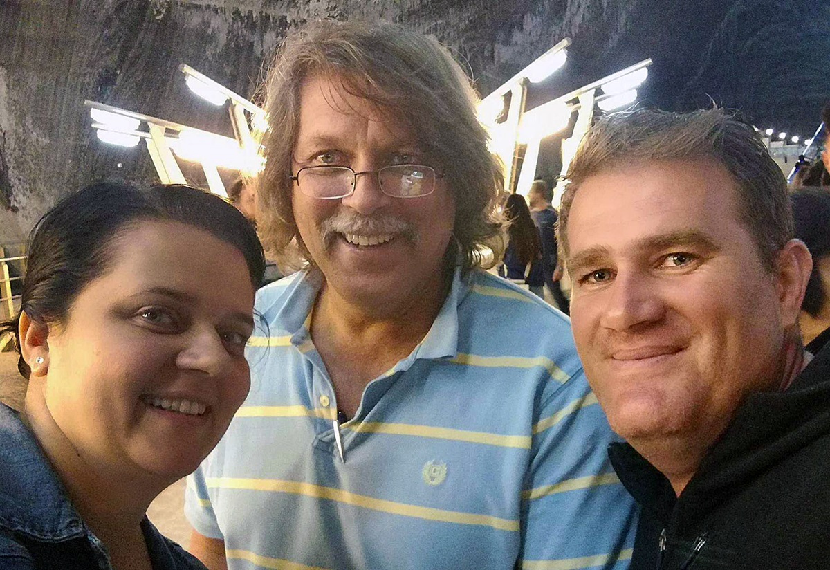Barry Kidwell, center, with Diana and Samuel Goia, in Romania this summer. Kidwell, a United Methodist pastor in Chattanooga, Tennessee, provided funds to purchase a plot of land in Comsesti, Romania, where the Goias have a ministry to the Roma people. Photo courtesy of Samuel Goia.