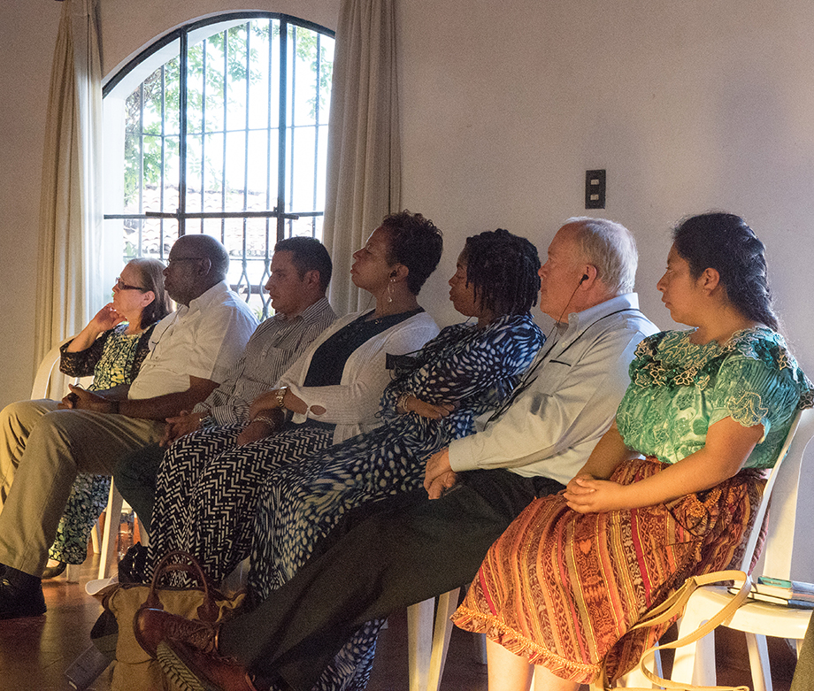 United Methodist bishops and members of the Evangelica Nacional Metodista Primitiva de Guatemala church listen to an overview of Guatemala and Methodism at Santo Tomas Hotel in Chichicastenango, Guatemala.  Photo by Kathy L. Gilbert, UMNS.