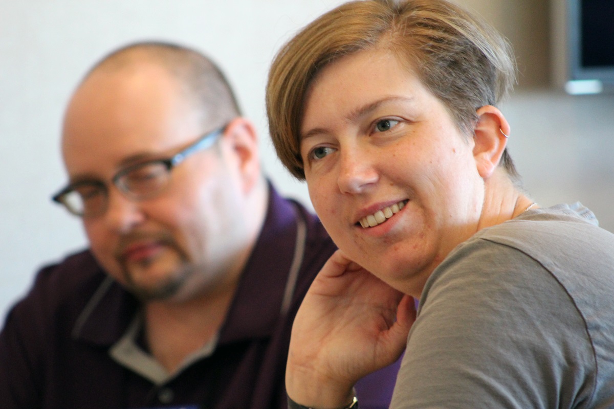 Mac Buff in conversation with other participants during a time of art and fellowship during 
Rooted, an ecumenical trans and gender-expanded retreat held in Chicago Aug. 11-13. 