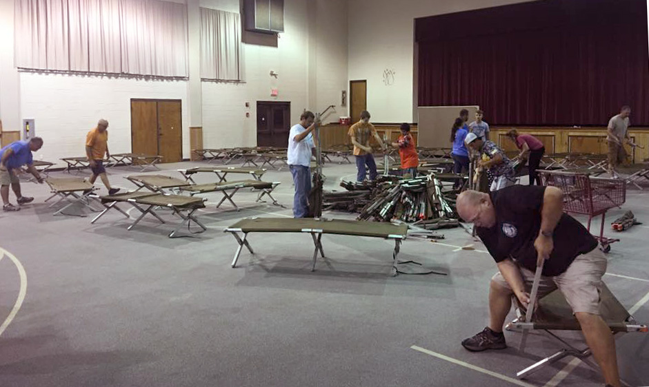 Volunteers from Boy Scout Troop 566 set up cots to receive evacuees from Hurricane Irma at Trinity United Methodist Church in Warner Robins, Ga. Photo courtesy of Trinity United Methodist Church via Facebook.