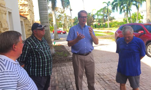 Bishop Kenneth H. Carter Jr. (second from right) visits First United Methodist Church in Naples, Fla., following Hurricane Irma. 