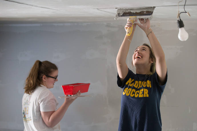 Volunteers Beth Carter (right) and Josie Johnson of South Roanoke (Va.) United Methodist Church help repair a home in the Swinging Bridge community near Clay, W. Va. Photo by Mike DuBose, UMNS.
