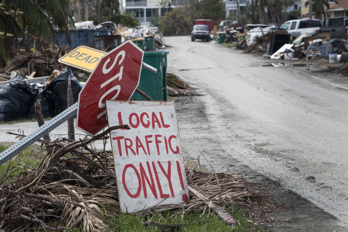Debris and damage from Hurricane Irma is visible in this neighborhood street in the village of Goodland, located on the tip of Marco Island, Fla. Photo by Kathleen Barry, UMNS.