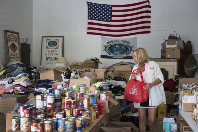 Laurie Diefenthaler volunteers at the community distribution center located in Goodland, Fla. This community was hit hard by Hurricane Irma. Diefenthaler has resided in the community for 17 years. Photo by Kathleen Barry, UMNS.
