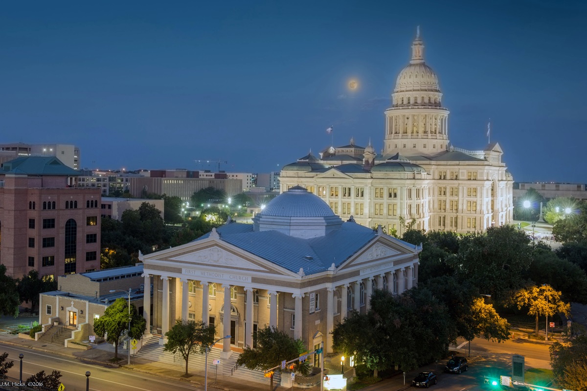 A view of First United Methodist Church in Austin, Texas, with the state capitol dome rising behind it. Photo by J.M. Hicks, courtesy of First United Methodist Church.