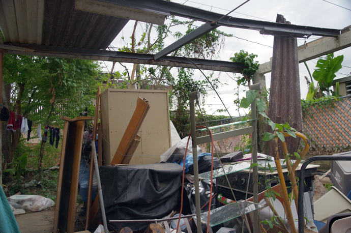 Belongings are piled under the open sky in a building damaged when Hurricane Maria swept over Puerto Rico causing widespread destruction. Sept. 20. Photo by the Rev. Gustavo Vasquez, UMNS.