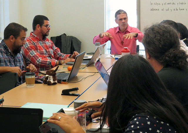 The Rev. Harold Recinos, a professor at Perkins School of Theology, leads discussion in a class on Latin American liberation theology. The students are part of an advanced theology degree program Perkins is offering in Spanish, a first for a United Methodist seminary. Photo by Sam Hodges, UMNS
