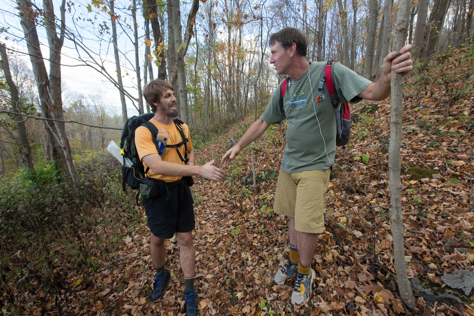 The Rev. Matt Hall (left) visits with hiker Patrick Dolin on the Appalachian Trail near Pearisburg, Va.