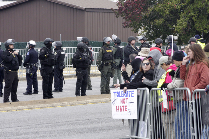In Shelbyville, Tenn., law enforcement kept the white nationalists and counterprotesters cordoned off into separate sections across a four-lane road. To enter either side, people had to go through two checkpoints where law enforcement swiped them with metal detectors. Photo by Kathy L. Gilbert, UMNS.