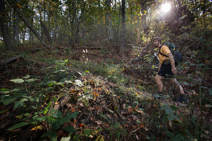 The Rev. Matt Hall hikes on the Appalachian Trail near Pearisburg, Va.