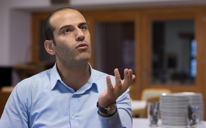 Kuscha Alipoor is one of four people who have taken sanctuary at the United Methodist Church of the Redeemer in Bremen, Germany. Alipoor, from Iran, now works as the church superintendent. “I am happy because I have rights, I am in a very safe country,” he said. Photo by Mike DuBose, UMNS.