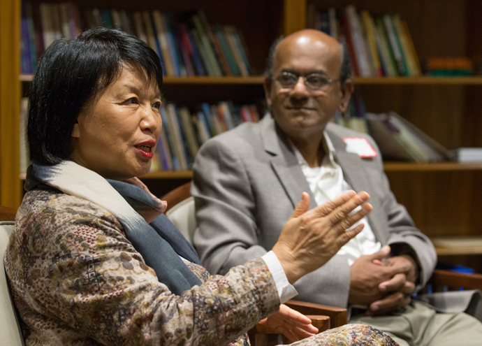 The Revs. Im Jung, left, and Sam Royappa discuss ministry partnerships with the Methodist Church in India during a visit by bishops of the church in India to The Upper Room in Nashville, Tenn. Photo by Mike DuBose, UMNS.