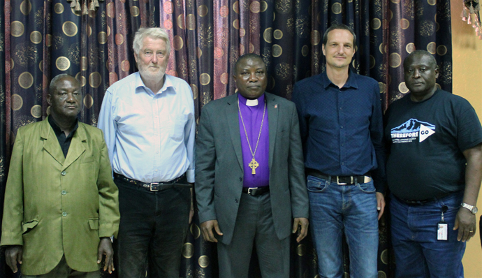 From left, the Rev. Robert Sieh, Stein Skjorshammer, Bishop Samuel J. Quire, Pietr Kwasowski and the Rev. George D. Wilson Jr. gathered after a meeting. Photo by Julu Swen, UMNS.