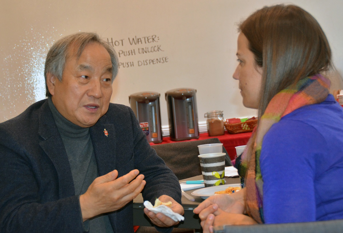 Bishop Hee-Soo Jung speaks with Rebecca Cole, director of grassroots organizing at the United Methodist Board of Church and Society, at the three-day “Peace on the Korean Peninsula” seminar held at the United Methodist Building in Washington, Nov. 13-15. Korean-American United Methodists added their voices to the growing number of people calling on the U.S. government to tone down the rhetoric on North Korea. Photo by Erik Alsgaard, the Baltimore-Washington Conference.