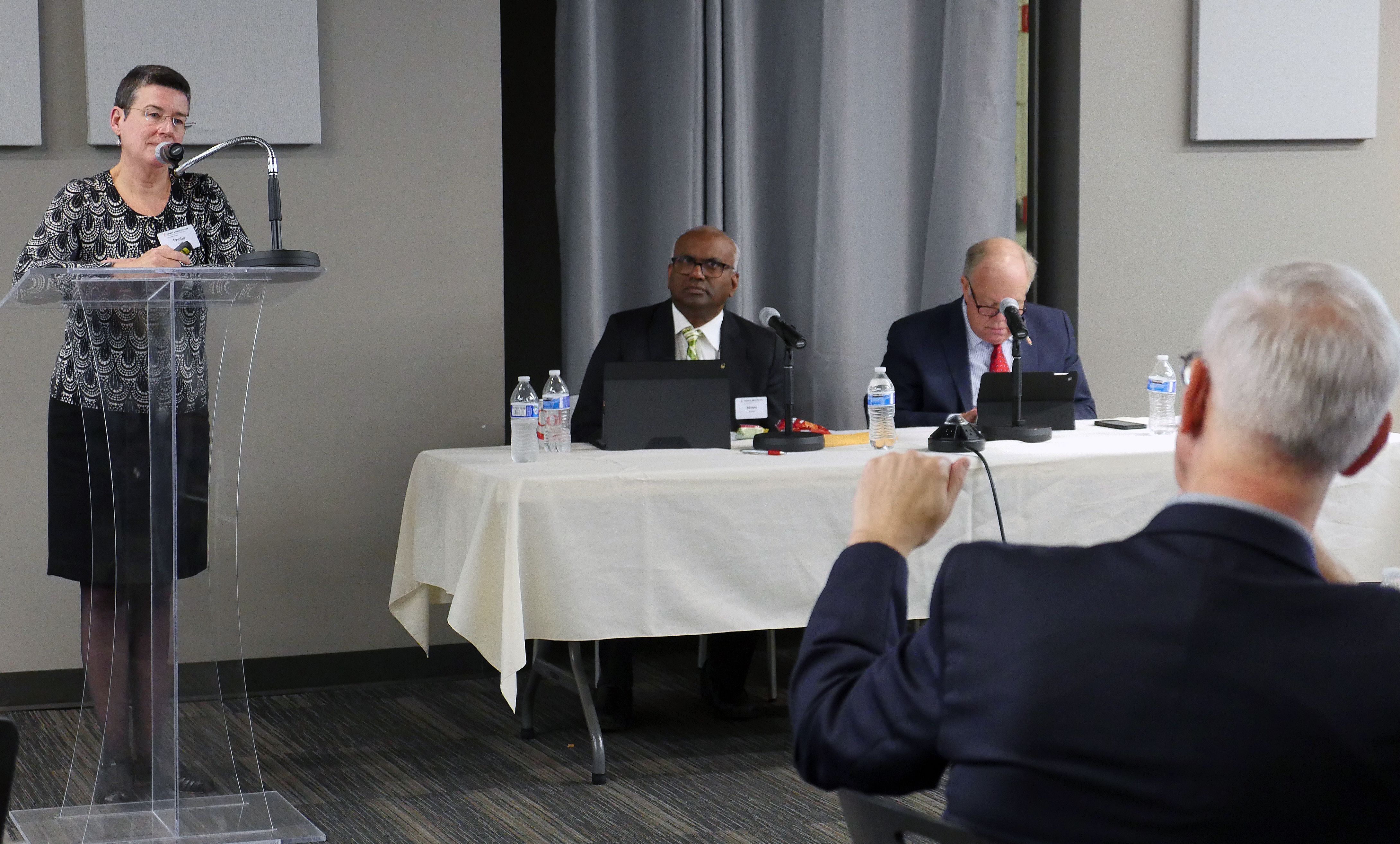 Phebe Duff (left) listens to a question from the Rev. Steve Court, General Council on Finance and Administration board member, about a new compensation structure for general agency staff. Duff, GCFA’s global director of human resources, presented the proposed pay ranges during the board’s meeting Nov. 15 at the United Methodist Publishing House. Photo by Heather Hahn, UMNS