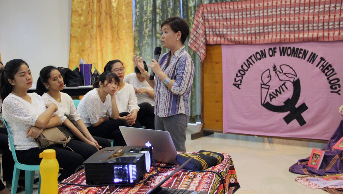Darlene Marquez-Caramanzana, a United Methodist deaconess, speaks during the International Declaration on the Elimination of Violence against Women in Quezon City, Philippines. The National Council of Churches in the Philippines and the Association of Women in Theology sponsored the observance. Photo by Jonathan Sta. Rosa.