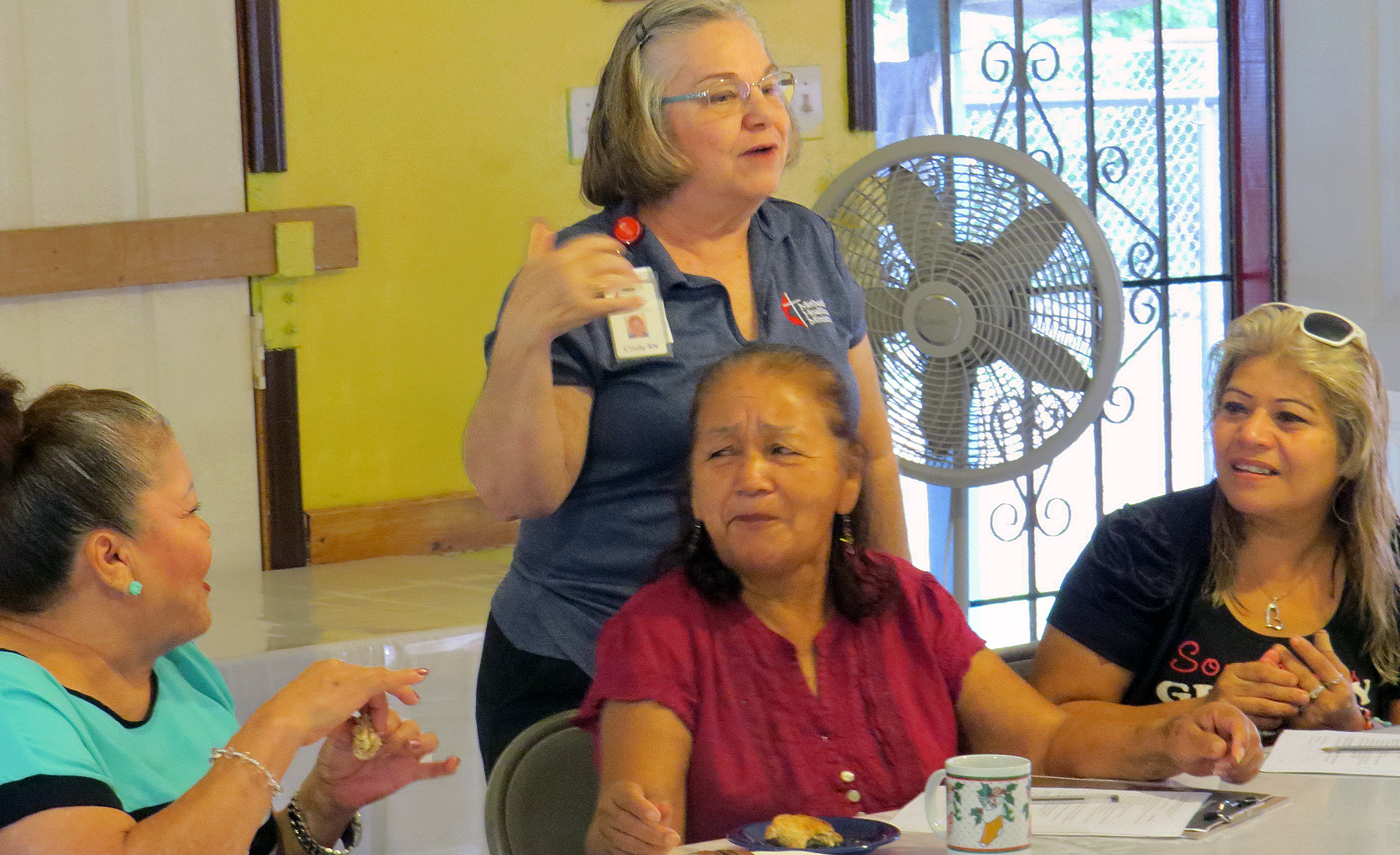 Cindy Bishop, Wesley Nurse, leads a nutrition class in the community center of a colonia, east of Edinburg, Texas. Bishop is based at the First United Methodist Church in Edinburg, one of 88 church-based Wesley Nurses employed by Methodist Healthcare Ministries of South Texas. The nurses focus on improving the health of the uninsured. Photo by Sam Hodges, UMNS.